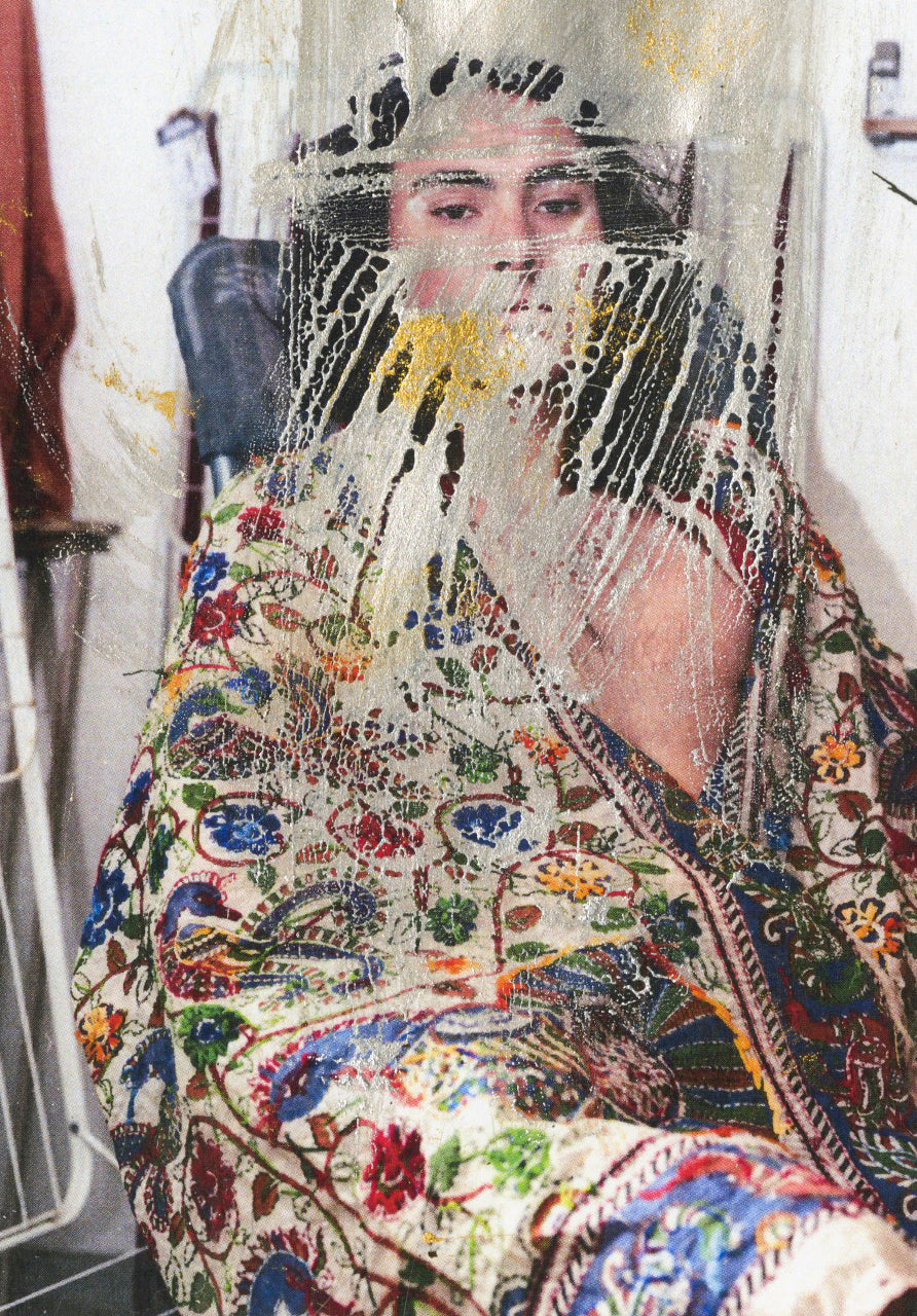 A colorful art poster featuring a blurred image of a person in a vibrant, multicolored traditional outfit with floral patterns, possibly representing a scene from 'Laundry day' by Vitaboy.